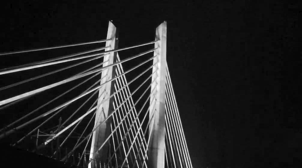 black and white photo of part of the Tilikum bridge